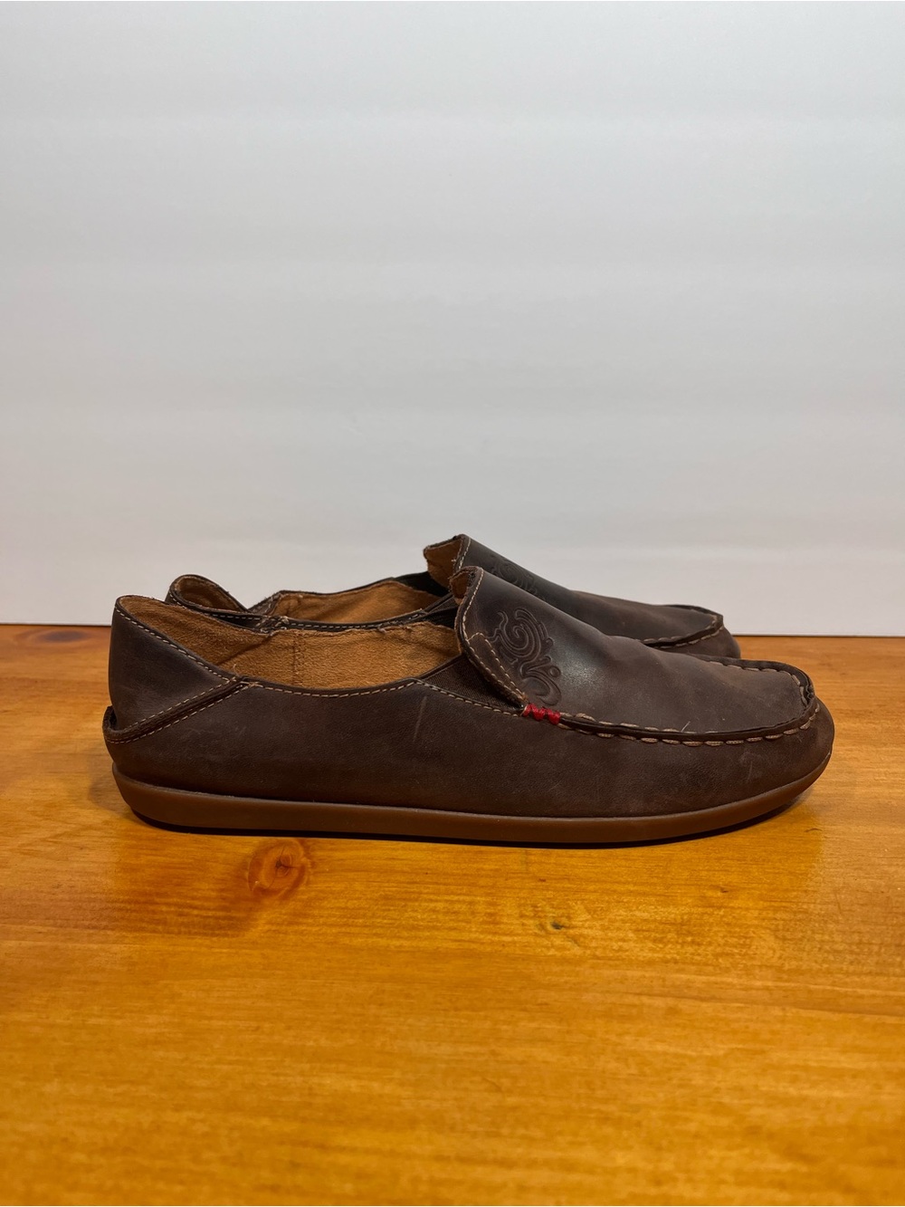 OluKai Nohea Nubuck Women’s Dark Brown Leather Slip-On Moccasins